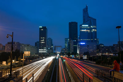 Light trails on city street at night