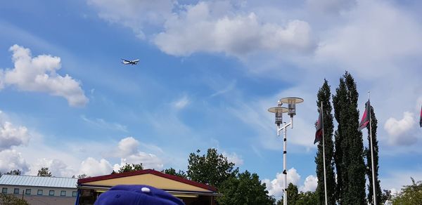 Low angle view of airplane flying in sky