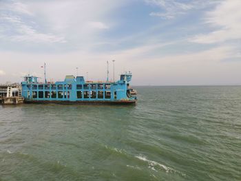 Nautical vessel on sea against sky