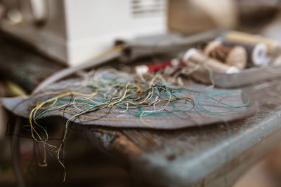 Close-up of thread on table