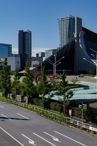 View of city buildings against clear sky