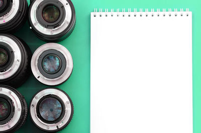 High angle view of objects on table against white background