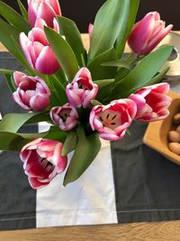 Close-up of pink flower pot on table