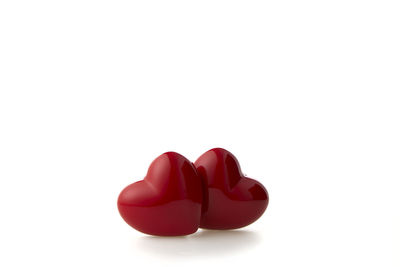 Close-up of heart shape over white background