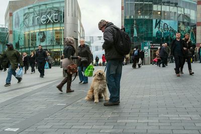 People walking on city street