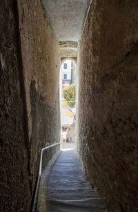 Narrow alley amidst old buildings