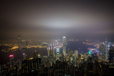 Illuminated cityscape at night