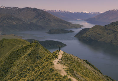 Scenic view of lake amidst mountains