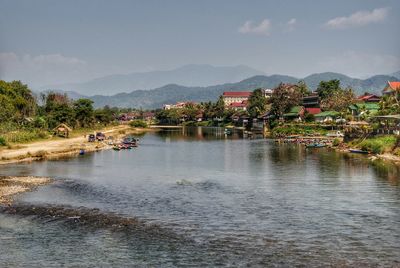 Scenic view of river and mountains