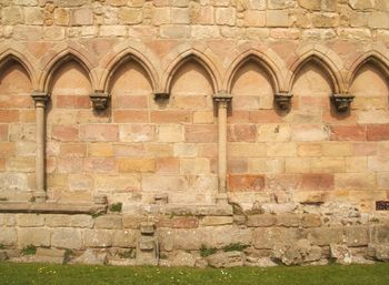 Low angle view of brick wall of building