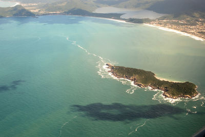 High angle view of sea waves on shore