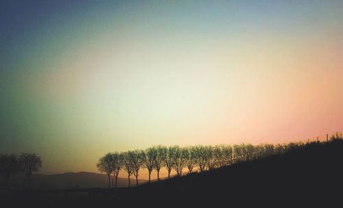 Scenic view of landscape at sunset