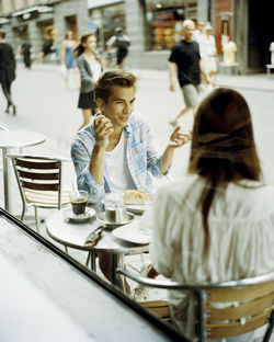 Young couple at cafe