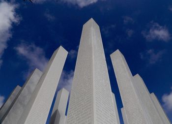 Low angle view of skyscrapers against sky