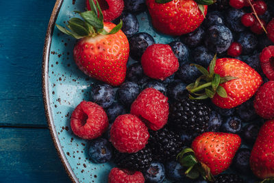 High angle view of strawberries on table