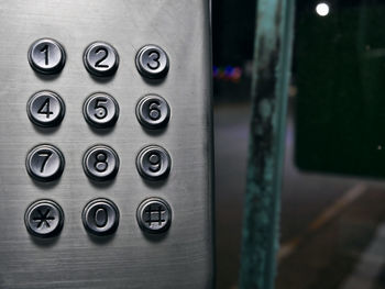 Close-up of push button with numbers