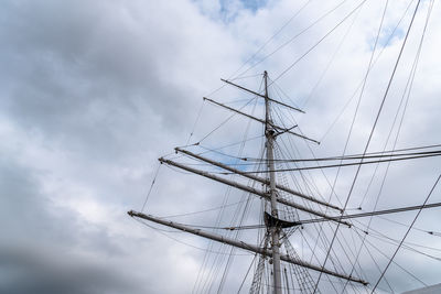 Low angle view of sailboat in sea against sky