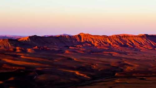 Scenic view of mountains during sunset