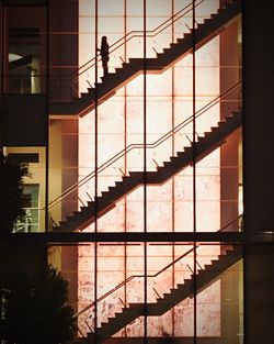 Silhouette built structures at sunset