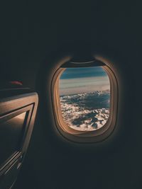 View of airplane seen through window