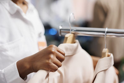 Midsection of doctor examining patient in hospital