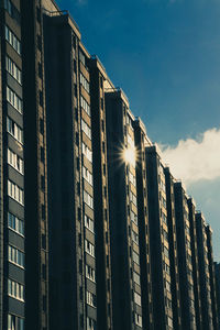 Low angle view of modern buildings against sky