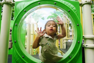 Portrait of happy girl in playground