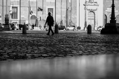 Full length of man walking in city