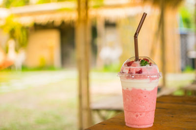 Close-up of drink served on table