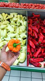 High angle view of red chili peppers in market
