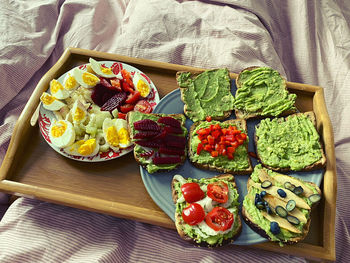 High angle view of fruits in plate on table