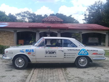 Vintage car against building