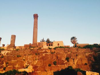 Low angle view of old ruin against clear sky