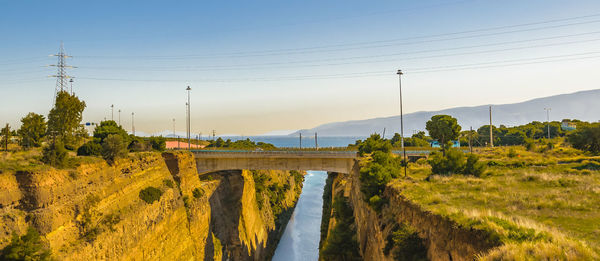 Bridge over river against sky