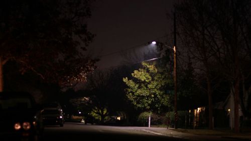 Cars on road at night