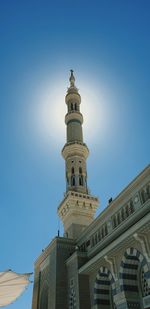 Low angle view of buildings against clear blue sky