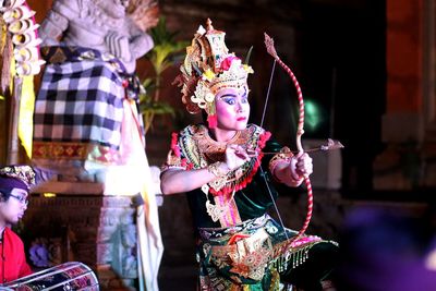 Young woman performing traditional dancing