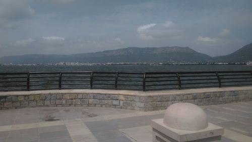 Scenic view of mountain against cloudy sky