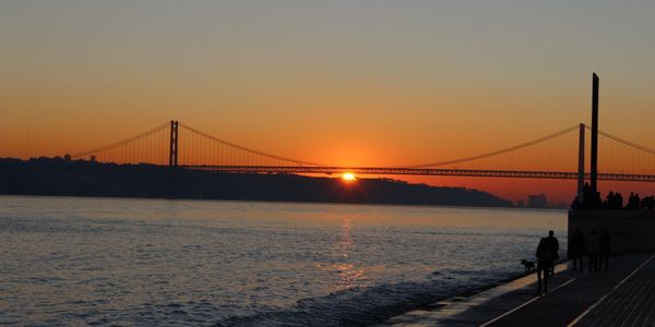Wide shot of golden gate bridge during sunset