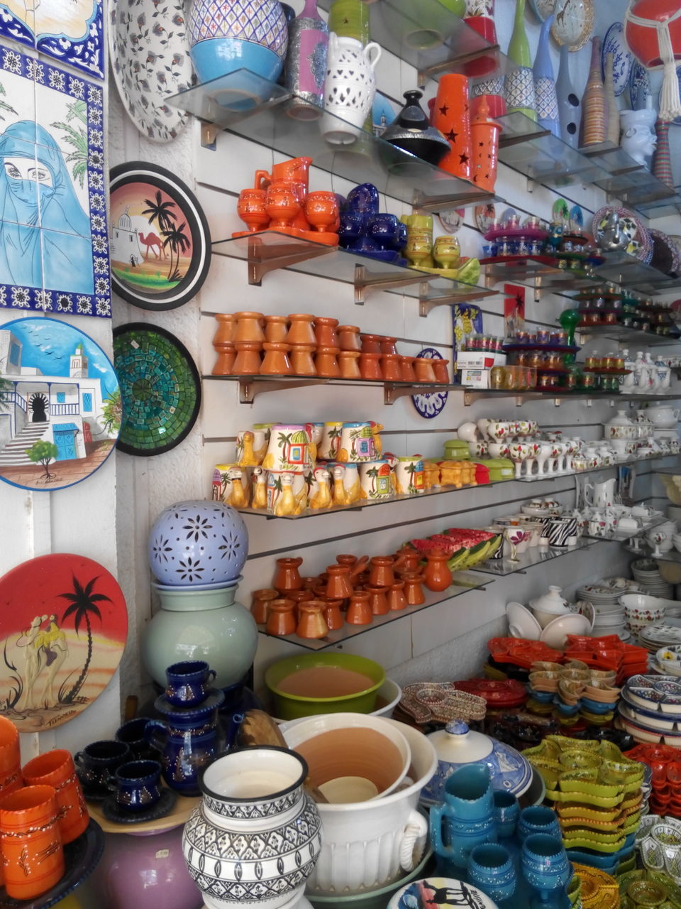 variation, choice, large group of objects, no people, retail, high angle view, arrangement, neat, market stall, shelf, multi colored, for sale, indoors, market, day, price tag, freshness