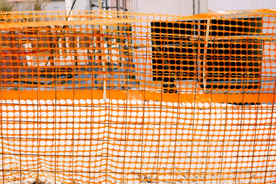 Low angle view of orange construction site