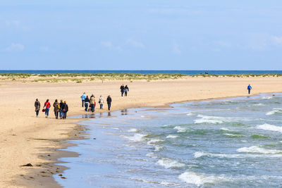 People who walk on the beach in skagen. danmark