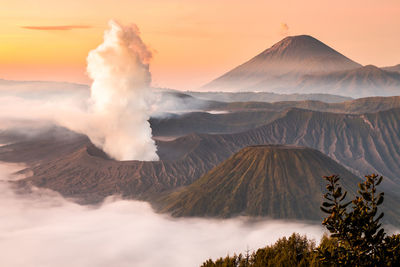 Panoramic view of volcanic landscape against sky during sunset