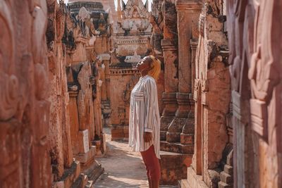 Woman standing in temple