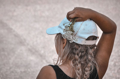 Rear view of girl wearing hat