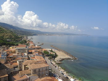 High angle view of sea against cloudy sky