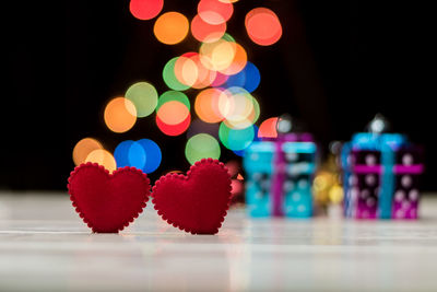 Close-up of multi colored lights on table