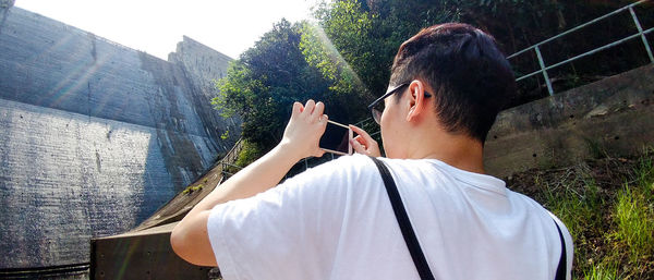Midsection of man in park