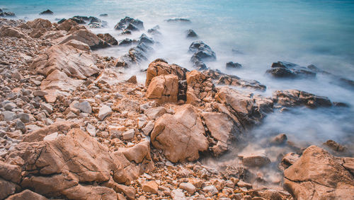 High angle view of rocks on beach