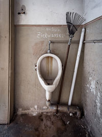 Dirty urinal in public restroom